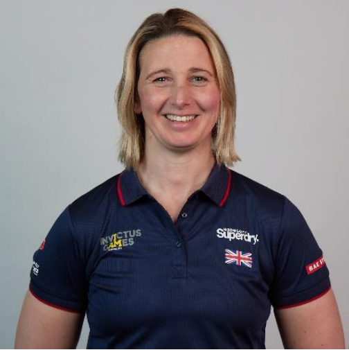 Personnel wears Invictus Games uniform in portrait.